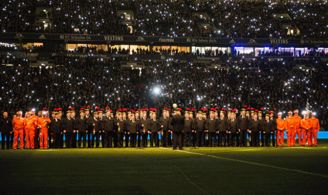 a choir of pitmen of shut down coal mine pit auguste victoria in marl sing on the pitch ahead of the german first division football match fc schalke 04 vs 1899 hoffenheim in gelsenkirchen western germany on december 18 2015 photo afp a choir of pitmen of shut down coal mine pit auguste victoria in marl sing on the pitch ahead of the german first division football match fc schalke 04 vs 1899 hoffenheim in gelsenkirchen western germany on december 18 2015 photo afp