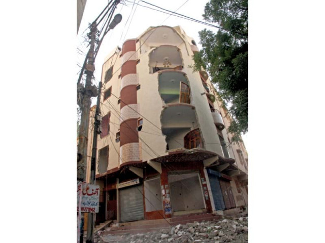 residents were forced to leave their belongings behind when the building was evacuated on friday photo athar khan express