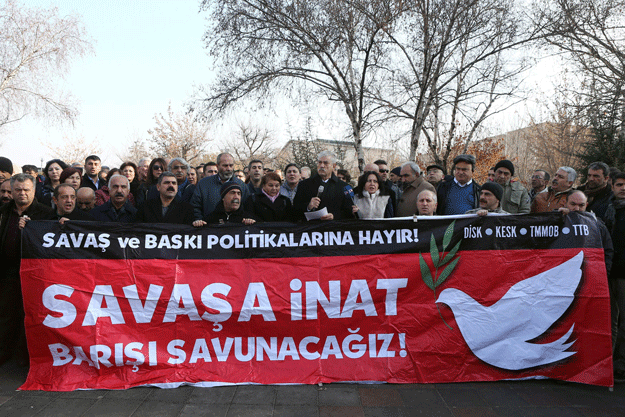 members of turkey 039 s leftist unions and politicians stage a protest outside the parliament in ankara calling for the end of military operations against kurdish militants in southeastern turkey on december 19 2015 photo afp