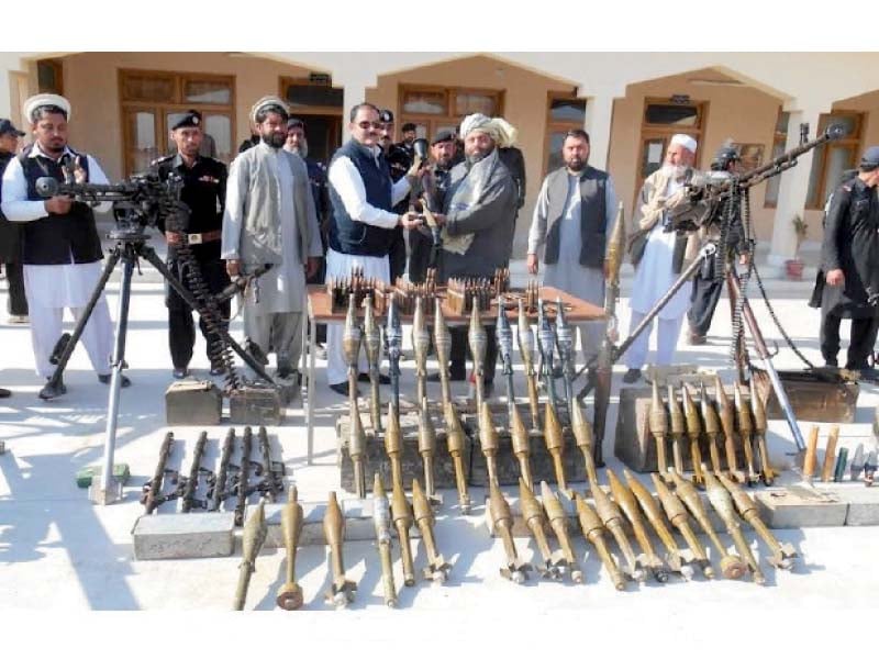 members of the peace committee return weapons at bahai dag mohmand photo express