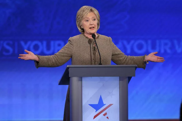democratic us presidential candidate hillary clinton reacts as she reaches her podium after she failed to return from a break in time for the resumption of discussions at the democratic presidential candidates debate at st anselm college in manchester new hampshire on december 19 2015 photo reuters democratic us presidential candidate hillary clinton reacts as she reaches her podium after she failed to return from a break in time for the resumption of discussions at the democratic presidential candidates debate at st anselm college in manchester new hampshire on december 19 2015 photo reuters