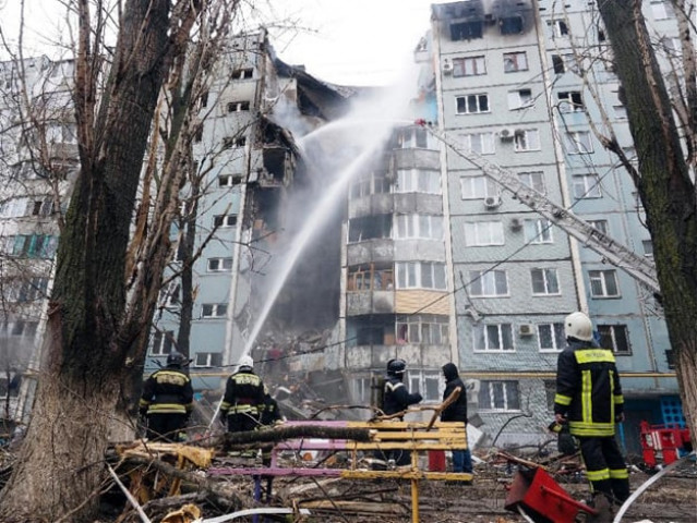 firefighter work to extinguish a fire after blast that led to the partial collapse of a building in volgograd on december 20 2015 photo afp firefighter work to extinguish a fire after blast that led to the partial collapse of a building in volgograd on december 20 2015 photo afp