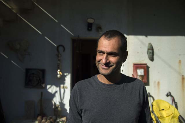 israeli film director of iranian descent yuval delshad gestures during an interview with afp reporters at his house in the israeli city of tel aviv on december 8 2015 delshad is the director behind quot baba joon quot the first feature film in israeli cinema to be shot in iran 039 s national language which tells the story of a family of iranian jews living on a farm in southern israel photo afp