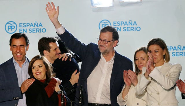 spanish prime minister popular party pp leader and candidate for general election mariano rajoy 3rd r waves after delivering a speech next to his wife elvira fernandez r vice president of the spanish government soraya saenz de santamaria l pp secretary general and candidate maria dolores de cospedal r and other party members at pp 039 s headquarters after the results of spain 039 s general election in madrid on december 20 2015 photo afp spanish prime minister popular party pp leader and candidate for general election mariano rajoy 3rd r waves after delivering a speech next to his wife elvira fernandez r vice president of the spanish government soraya saenz de santamaria l pp secretary general and candidate maria dolores de cospedal r and other party members at pp 039 s headquarters after the results of spain 039 s general election in madrid on december 20 2015 photo afp