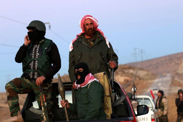 fighters from iraqi kurdish forces are seen taking part in an operation in sinjar that reportedly delivered a quot massive blow quot to islamic state last month photo afp