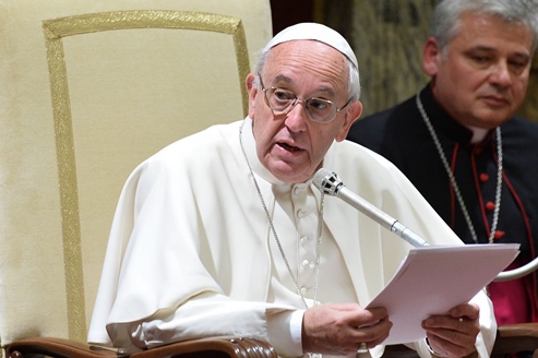 pope francis speaks during the traditional greetings to the roman curia on december 21 2015 at the vatican photo afp