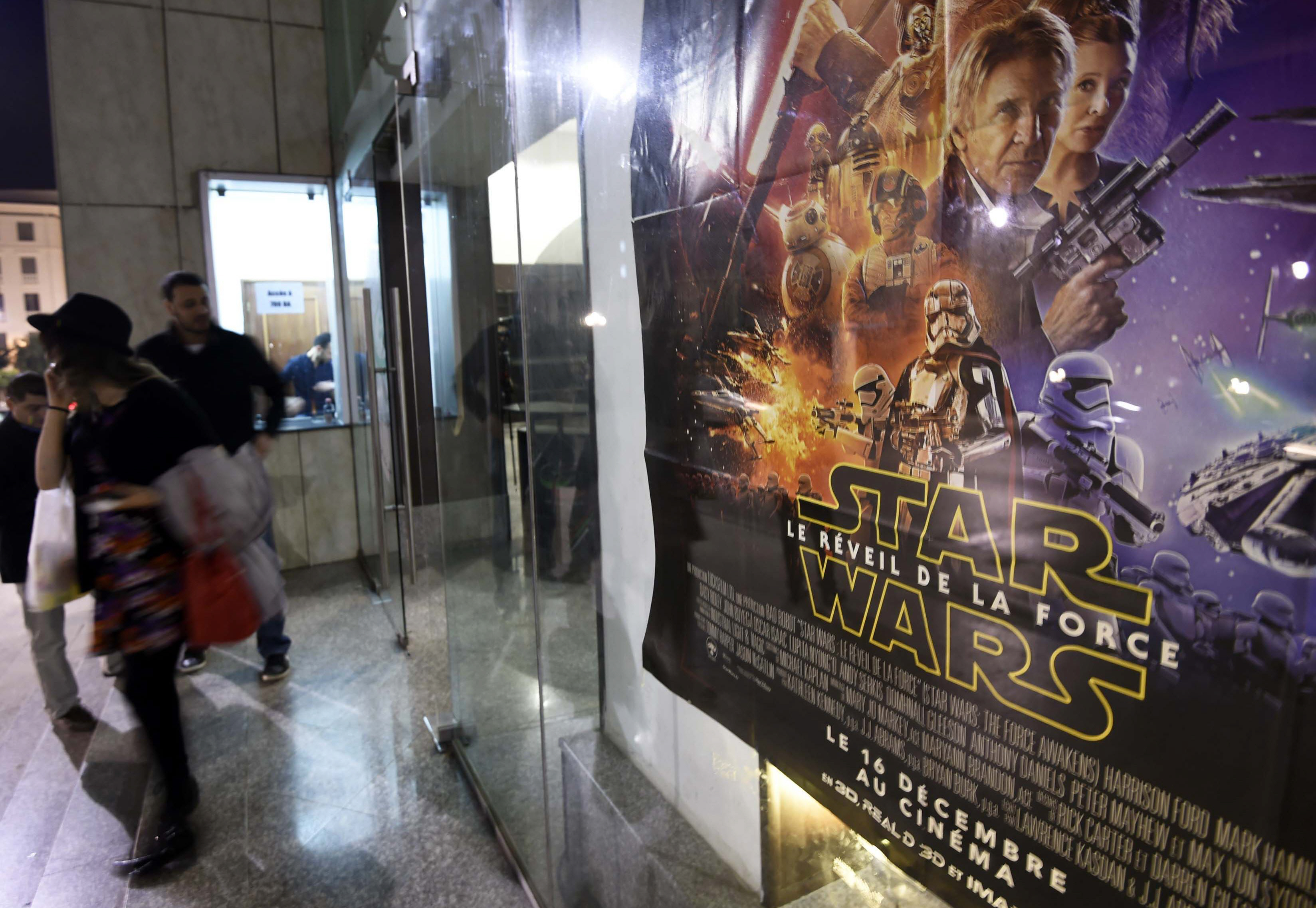 quot star wars quot fans wait outside the cinema prior to the premier screening of the latest quot star wars the force awakens quot film in the algerian capital algiers on december 20 2015 globally the latest quot star wars quot space epic raked in an estimated 517 million disney said breaking records for biggest opening weekend abroad in 18 other countries including russia and germany and second biggest across four nations photo afp