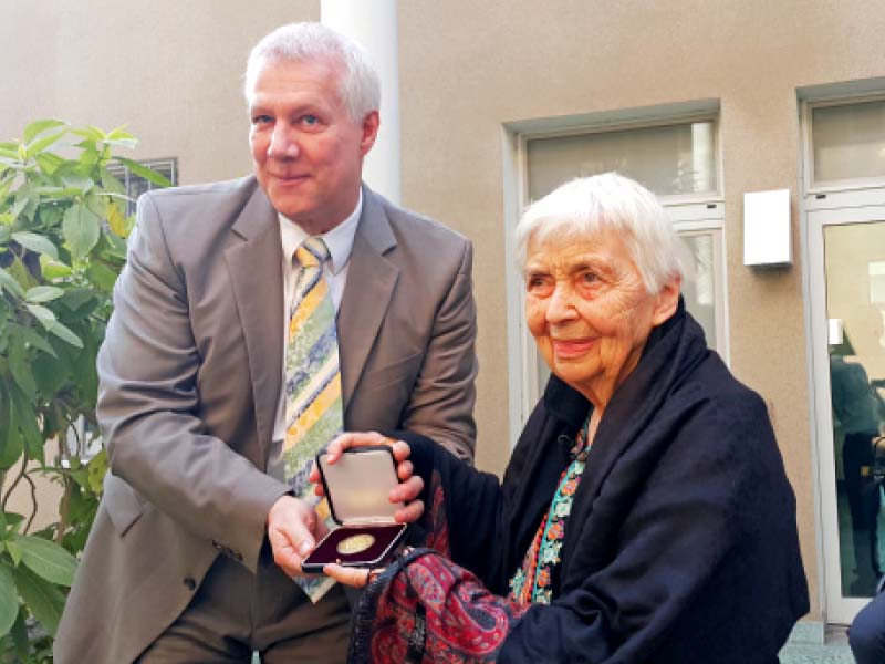 german consul general rainer schmiedchen presents the german staufer medal to dr ruth pfaus at the german consulate on monday photo courtesy german consulate