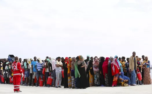migrants wait on the dock after disembarking from a medecins sans frontieres ship carrying 320 migrants in the sicilian harbour of augusta italy photo reuters migrants wait on the dock after disembarking from a medecins sans frontieres ship carrying 320 migrants in the sicilian harbour of augusta italy photo reuters