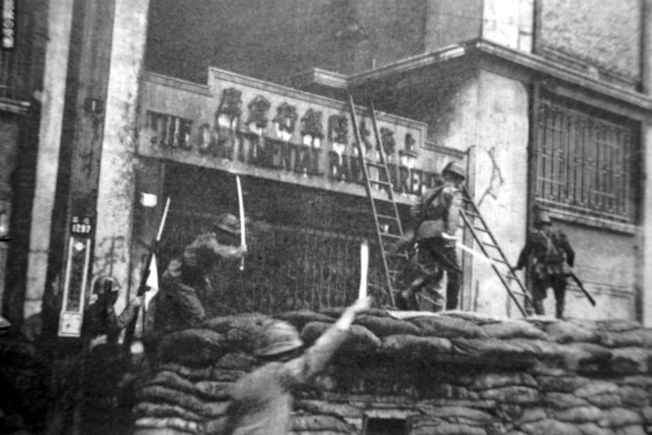 japanese troops storm a barricade during the fighting in nanjing photo courtesy nanjing people 039 s anti japan war museum