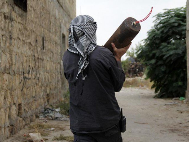 file photo of a man carrying an ied photo afp