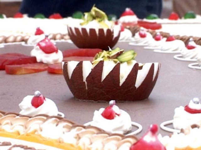 a part of the cake prepared at a shrine in multan photo express a part of the cake prepared at a shrine in multan photo express