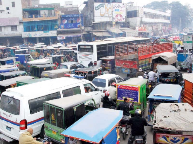 held up a traffic jam at allama iqbal road in garhi shahu on wednesday photo express