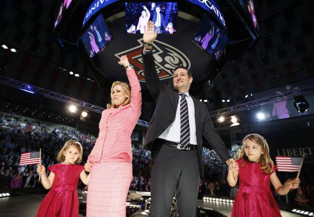 us senator ted cruz r tx stands on stage with his wife heidi and their daughters catherine and caroline as he announces his candidacy for president during an event at liberty college in lynchburg virginia march 23 2015 photo reuters