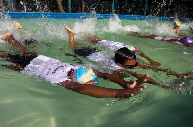 in this photograph taken on november 22 2015 young bangladeshi children take part in a swimming lesson in dhaka photo afp in this photograph taken on november 22 2015 young bangladeshi children take part in a swimming lesson in dhaka photo afp
