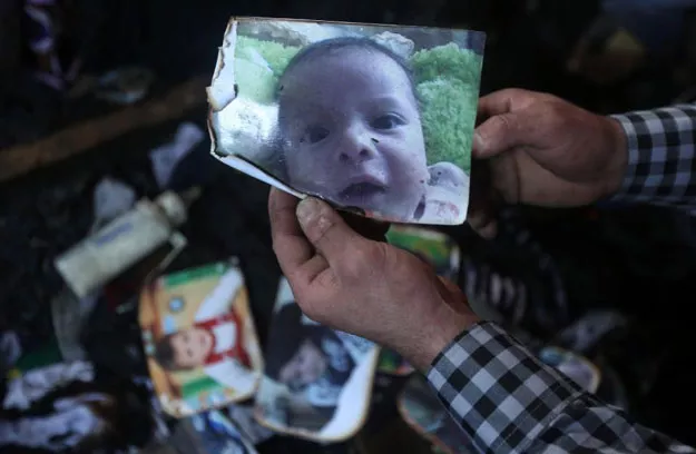 eighteen month old palestinian toddler ali saad dawabsha died when his family home was set on fire by jewish settlers in the west bank village of duma in july photo afp eighteen month old palestinian toddler ali saad dawabsha died when his family home was set on fire by jewish settlers in the west bank village of duma in july photo afp