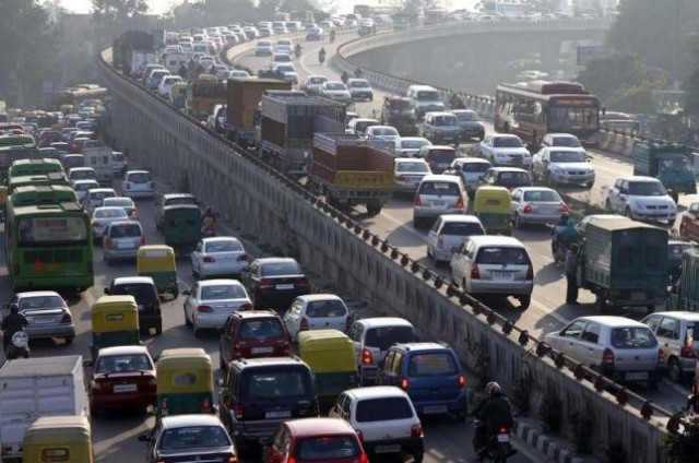 traffic moves along a busy road in new delhi january 11 2011 photo reuters traffic moves along a busy road in new delhi january 11 2011 photo reuters