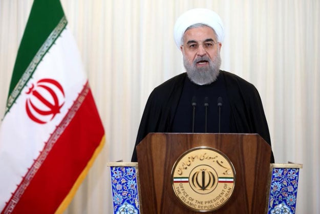 iran 039 s president hassan rouhani addresses the nation in a televised speech after the closure of iran 039 s nuclear probe at the iaea meeting at his office in tehran iran wednesday dec 16 2015 photo afp