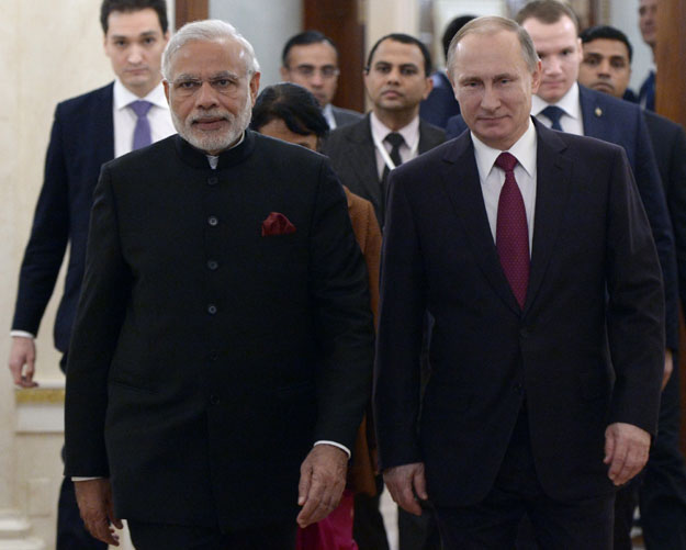 russian president vladimir putin r and india 039 s prime minister narendra modi enter a hall during a meeting at the kremlin in moscow on december 23 2015 photo afp