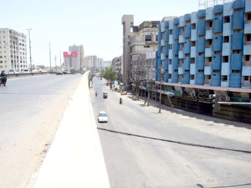 an otherwise bustling area of alkaram square bears a deserted look on eid due to the lockdown imposed by the government to prevent the spread of the coronavirus pandemic photo afp