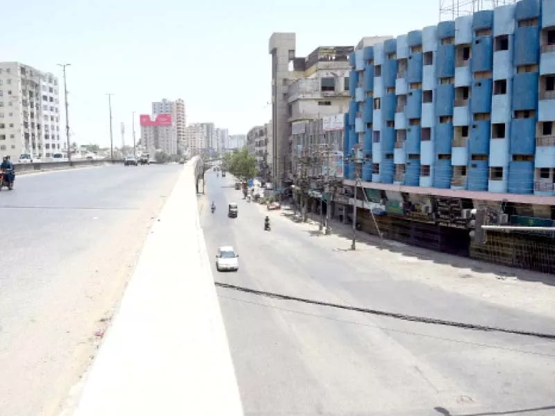 an otherwise bustling area of alkaram square bears a deserted look on eid due to the lockdown imposed by the government to prevent the spread of the coronavirus pandemic photo afp an otherwise bustling area of alkaram square bears a deserted look on eid due to the lockdown imposed by the government to prevent the spread of the coronavirus pandemic photo afp
