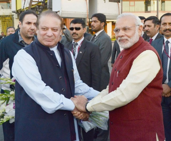 pm nawaz sharif shakes hands with his indian counterpart narendra modi upon latter 039 s arrival at the allama iqbal international airport in lahore on december 25 2015 photo pid pm nawaz sharif shakes hands with his indian counterpart narendra modi upon latter 039 s arrival at the allama iqbal international airport in lahore on december 25 2015 photo pid