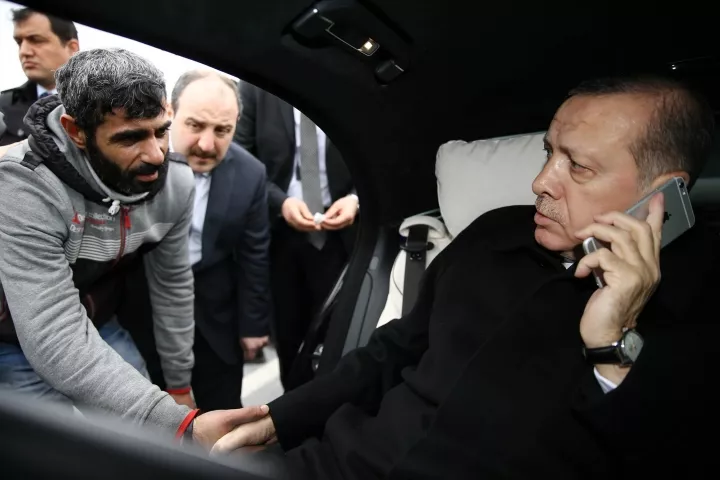 security guards of turkish president recep tayyip erdogan prevent suicide attempt on the bosporus bridge in istanbul turkey on december 25 2015 photo courtesy trt world security guards of turkish president recep tayyip erdogan prevent suicide attempt on the bosporus bridge in istanbul turkey on december 25 2015 photo courtesy trt world
