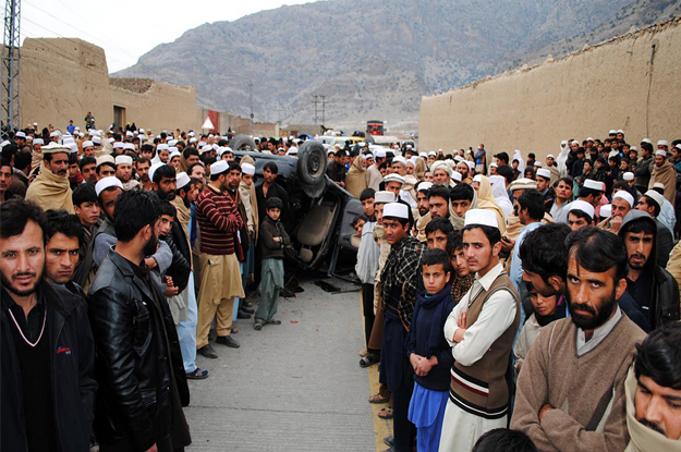 hundreds of tribesmen protesting against the political administration after the khasadar forces vehicle struck and killed a student on the road photo online