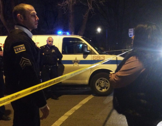 a chicago police sergeant speaks with a relative of a man who was killed by a police officer in the west garfield park neighborhood in chicago early saturday dec 26 2015 a chicago police officer shot and killed two people while responding to a domestic disturbance call in the neighborhood on the city 039 s west side police photo chicago tribune via ap a chicago police sergeant speaks with a relative of a man who was killed by a police officer in the west garfield park neighborhood in chicago early saturday dec 26 2015 a chicago police officer shot and killed two people while responding to a domestic disturbance call in the neighborhood on the city 039 s west side police photo chicago tribune via ap