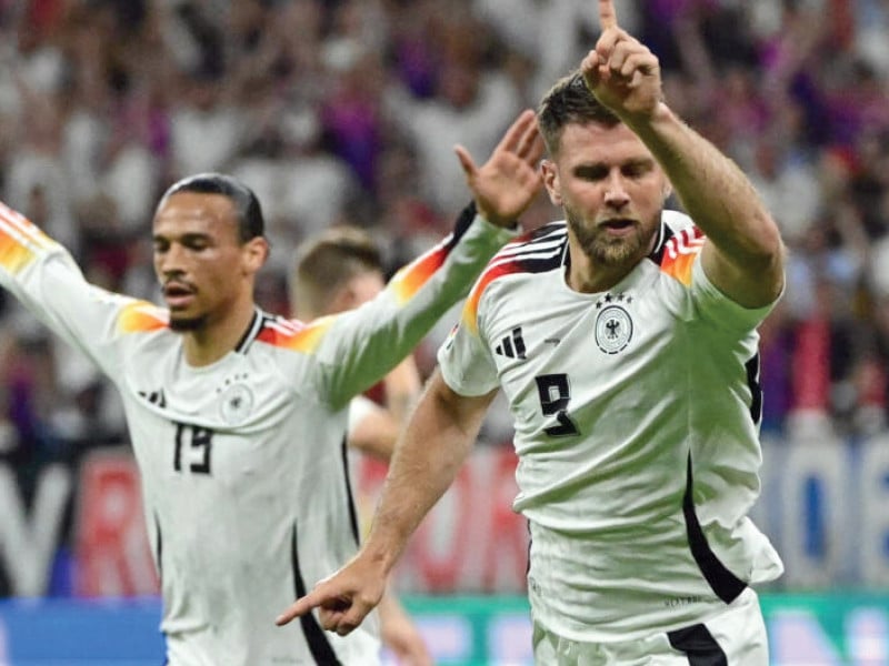 germany s niclas fuellkrug r celebrates his equaliser against switzerland photo afp