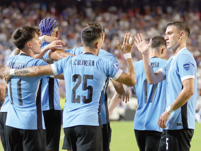 uruguay s mathias olivera celebrates after scoring the goal which helped eliminate the united states from the copa america photo afp