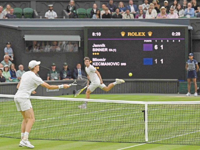 italy s jannik sinner wins a point against serbia s miomir kecmanovic during their men s singles tennis match at 2024 wimbledon championships photo afp italy s jannik sinner wins a point against serbia s miomir kecmanovic during their men s singles tennis match at 2024 wimbledon championships photo afp