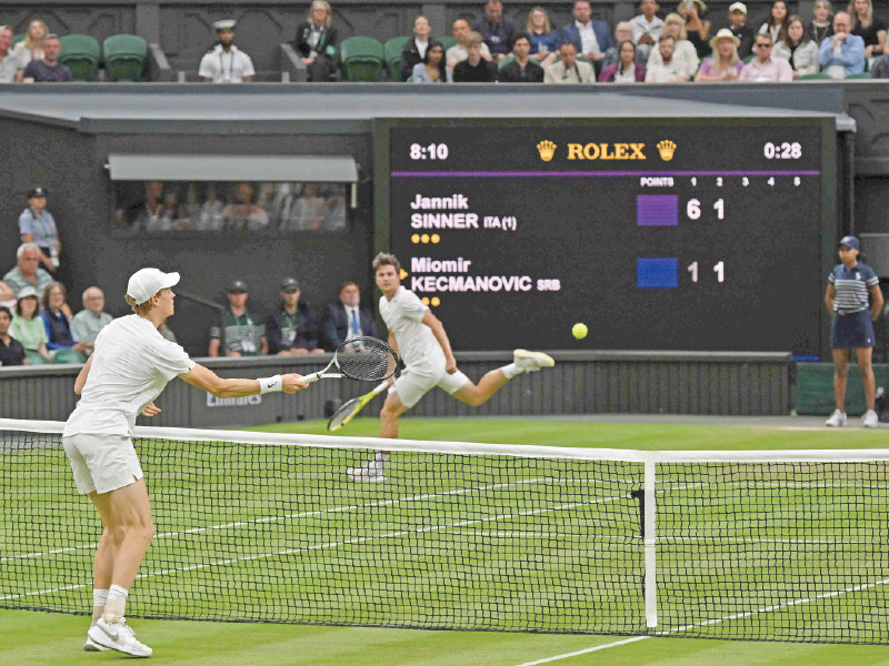 italy s jannik sinner wins a point against serbia s miomir kecmanovic during their men s singles tennis match at 2024 wimbledon championships photo afp