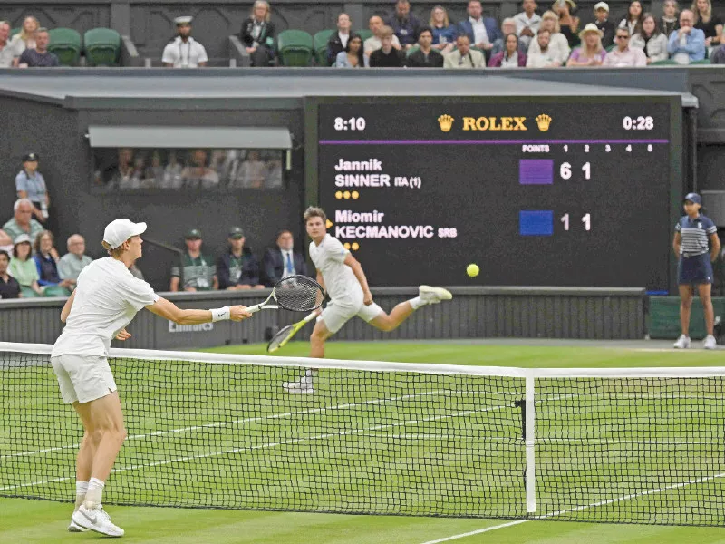 italy s jannik sinner wins a point against serbia s miomir kecmanovic during their men s singles tennis match at 2024 wimbledon championships photo afp italy s jannik sinner wins a point against serbia s miomir kecmanovic during their men s singles tennis match at 2024 wimbledon championships photo afp