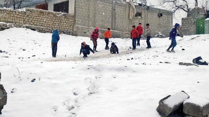 children play in snow in skardu photo courtesy raza qasir