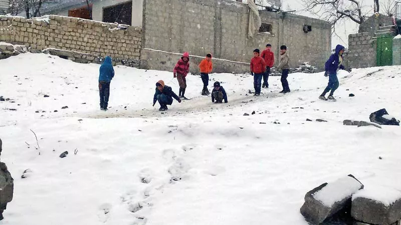 children play in snow in skardu photo courtesy raza qasir children play in snow in skardu photo courtesy raza qasir