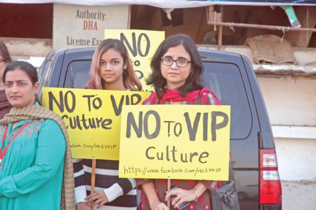 demonstrators distributed bumper and windscreen stickers against vip culture photo athar khan express demonstrators distributed bumper and windscreen stickers against vip culture photo athar khan express