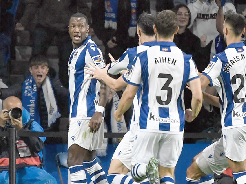 real sociedad forward sheraldo becker l celebrates with teammates after scoring against barcelona photo afp