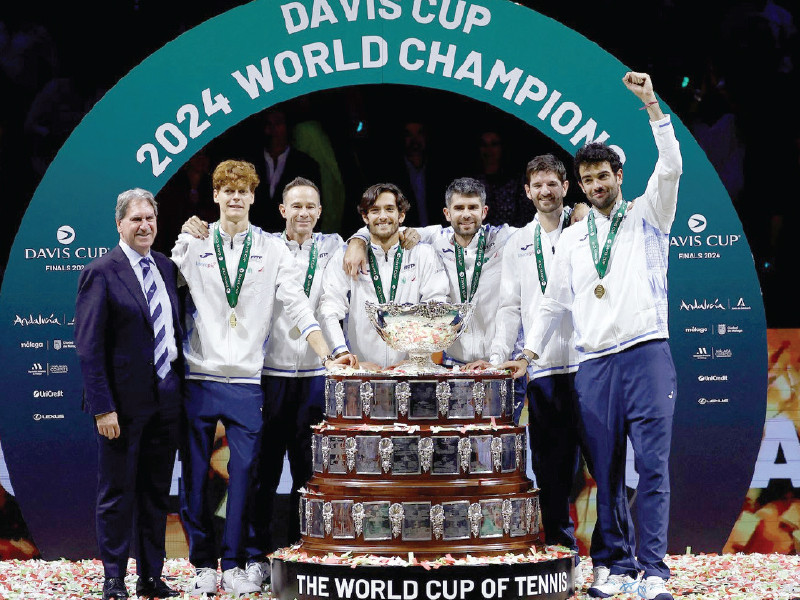 jannik sinner celebrates davis cup victory with his italian teammates photo afp