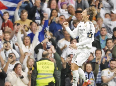 modric hits rocket as real madrid beat girona