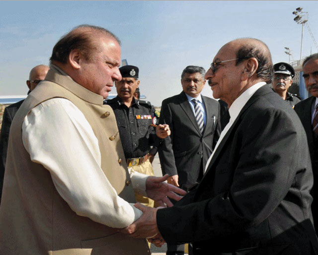 prime minister nawaz sharif shakes hands with sindh chief minister syed qaim ali shah after his arrival at karachi airport on december 28 2015 photo courtesy radio pakistan