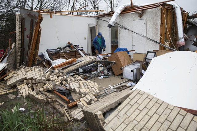 a heavily damaged residence is seen december 27 2015 in the aftermath of a tornado in rowlett texas photo afp