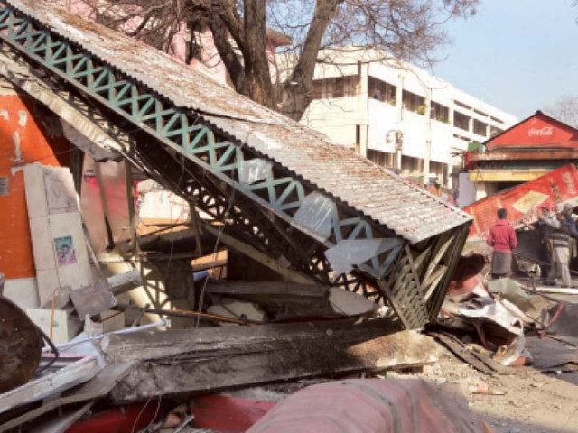 a cda team demolished illegally constructed shops and other encroachments in melody food park photo mudassar raja express a cda team demolished illegally constructed shops and other encroachments in melody food park photo mudassar raja express