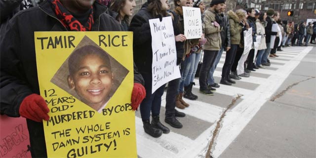 in november 2014 a black child who had been carrying a replica gun in a playground was shot dead by police photo tony dejak