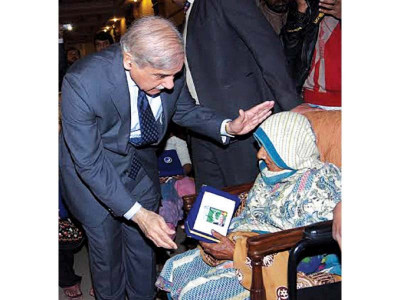 financial aid govt begins distribution of khidmat cards