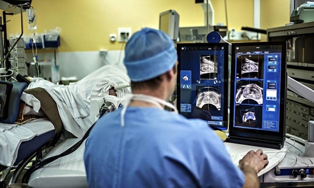 a surgeon performs a robot assisted prostate tumorectomy photo afp