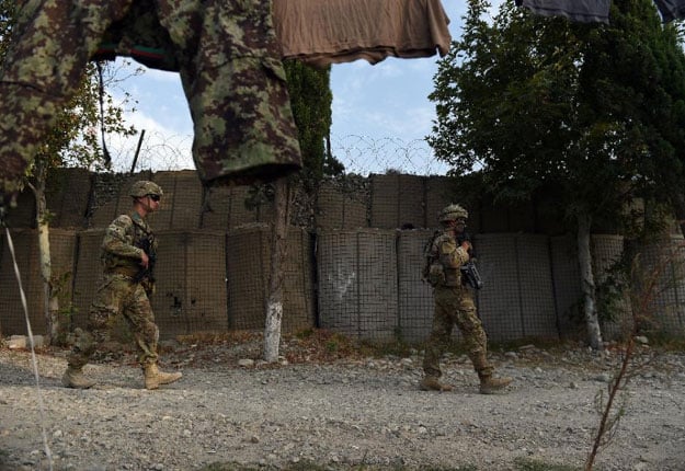 president barack obama in october announced that 9 800 us forces would remain in afghanistan until the end of 2016 photo afp