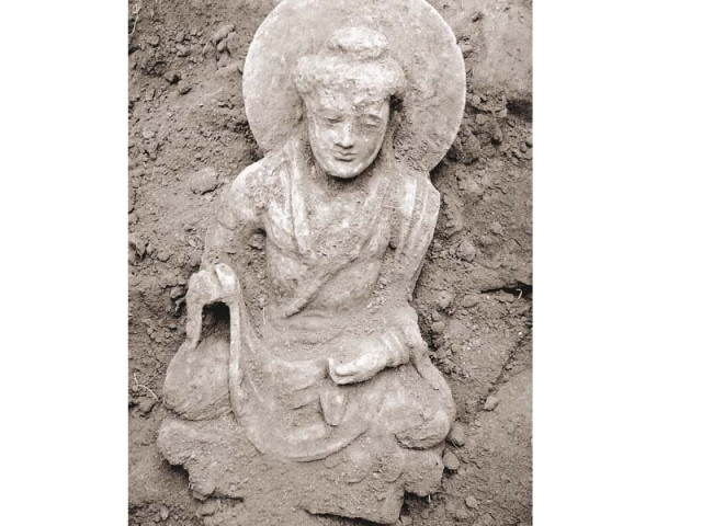 an illegally excavated damaged buddha statue photo hidayat khan an illegally excavated damaged buddha statue photo hidayat khan