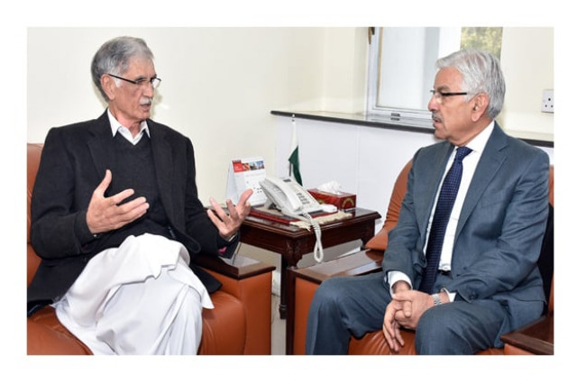 water and power minister khuwaja asif in a meeting with pervez khattak cm kpk photo inp water and power minister khuwaja asif in a meeting with pervez khattak cm kpk photo inp