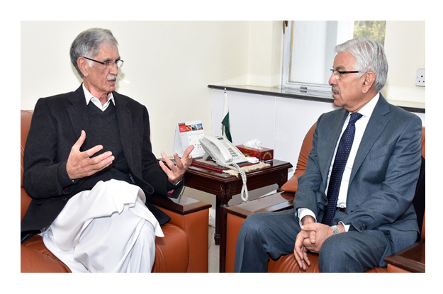 water and power minister khuwaja asif in a meeting with pervez khattak cm kpk photo inp